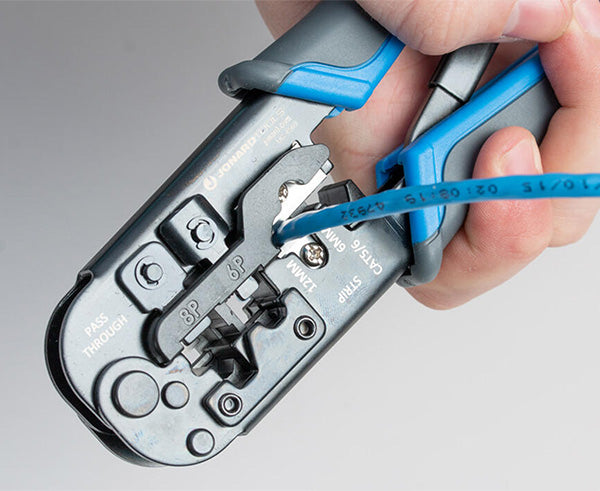 6-in-1 Crimping Tool, RJ45 Pass-through & RJ11/12 Modular - In use on blue cable - Primus Cable