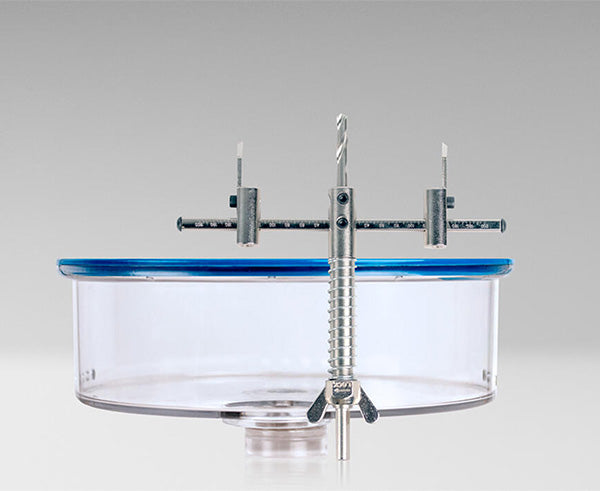 Adjustable Round Hole Cutter w/ Vacuum Port, 9" - Detailed look at drill bit and plastic vacuum bin - Primus Cable