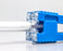 COAX Center Conductor Cleaner - Blue tool in use cleaning coax center conductor - Primus Cable
