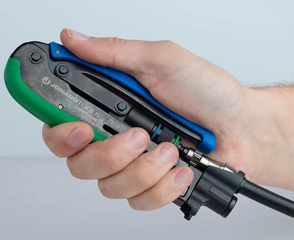Dual Compression Tool - Short and Long Style F Connectors - Blue and green compression tool in use - Primus Cable Hand Tools