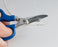 Ergonomic Electrician's Scissors - Scissors cutting white wire - Primus Cable