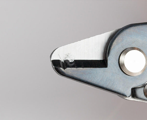 Ergonomic Fiber Optic Stripper, 250µ with Coating on Tool after Stripping Fiber