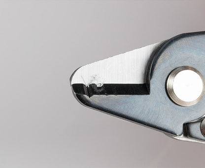 Ergonomic Fiber Optic Stripper, 250µ with Coating on Tool after Stripping Fiber