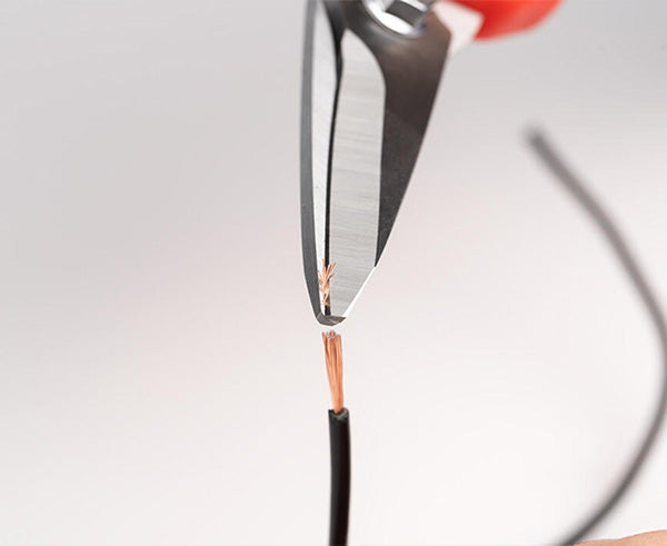 Heavy Duty Scissor with Wire Stripper - Scissors in use trimming ends of wire - Primus Cable