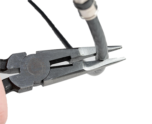 Telecom Long Nose Pliers - In use pinching a black cable - Primus Cable