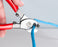 Copper COAX & Network Cable Cutter - Cutter in use on blue cable hand held - Primus Cable