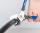 1" COAX Cable Cutter - Close up of tool in use - Primus Cable