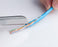 Jonard Ergonomic Cable Splicing Knife - Blue cutting through wires- Primus Cable 