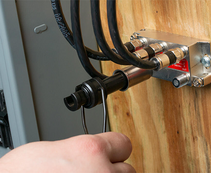 Security Shield Tool 7/16" - Tool in use on wall - Primus Cable