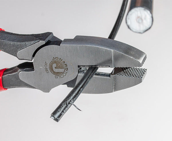 JIC-683 Lineman's Side Cut Pliers - In use bending cable - Primus Cable
