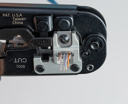 6-in-1 Crimping Tool, RJ45 Pass-through & RJ11/12 Modular - Close up of wire stripping - Primus Cable