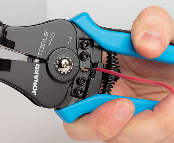 Wire Stripper and Cutter, 8-22 AWG - Close up of wire crimping - Primus Cable