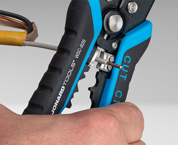 Wire Stripper & Crimper for 8 AWG-26 AWG - Cutting white wire - Primus Cable